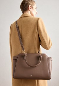 Sélectionné, taupe