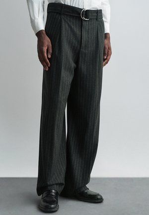 COLTEN - Trousers - black/grey