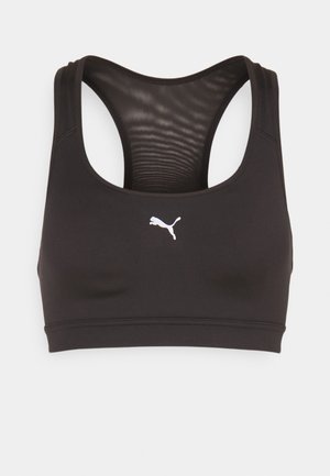 Melns sporta krūšturis ar apaļu izgriezumu un sacīkšu aizmuguri. Izgatavots no gludas auduma, ar baltu Puma logotipu priekšpusē.