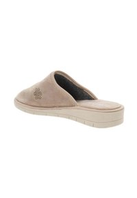 Pantofole beige sfoderate con una parte superiore morbida e testurizzata, interno imbottito e suola spessa e rigata. Presentano motivi decorativi perforati.