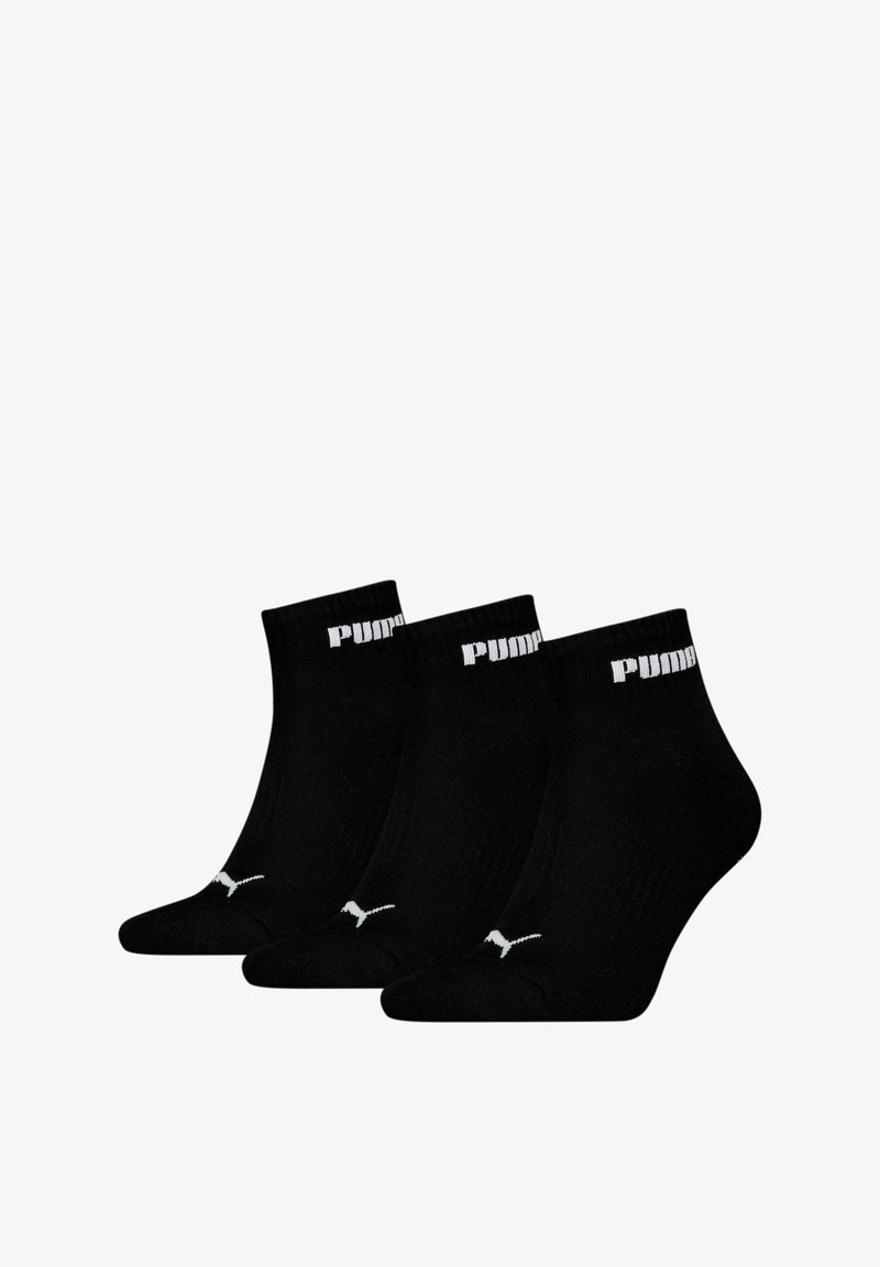 Chaussettes noires à chevilles en coton mélangé, ornées de texte blanc "PUMA" sur le revers, et d'un petit logo blanc sur la semelle. Trois paires incluses.