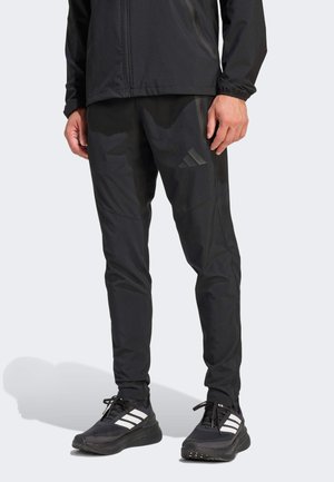 TIRO TRAVEL  - Tepláky - black   black