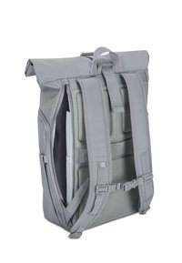 Gray roll-top backpack with padded shoulder straps, mesh back panel, and adjustable buckles. Features a sleek, streamlined design and durable material.
