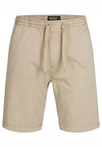 Shorts beige en coton avec une taille élastique, un cordon de serrage ajustable et des poches latérales. Présentent des coutures simples et une coupe décontractée.