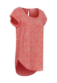 Blouse rouge à fleurs avec un décolleté arrondi, des manches courtes et un détail en forme de trou de serrure à l'arrière. Présente une coupe ample et un ourlet incurvé.