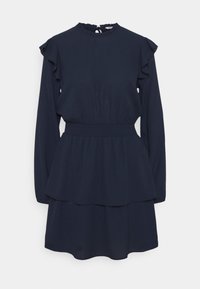 Mörkblå klänning med långa ärmar, volangdetaljer vid axlarna, elastisk midja och lagerdesign. Slät tyg med rund halsringning.