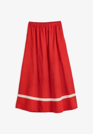 Jupe rouge trapèze avec taille élastique et galon de dentelle blanche horizontale près de l'ourlet, en tissu léger.