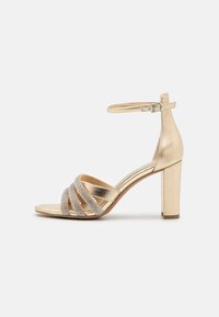 Marco Tozzi Sandalias de tacón - gold