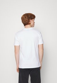 Santa Cruz FLIER HAND UNSIEX - T-shirt estampada - white