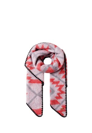 Écharpe en laine douce avec des motifs géométriques en zigzag rouge et gris, bords cousus noirs, et une petite étiquette rectangulaire en bas à droite.