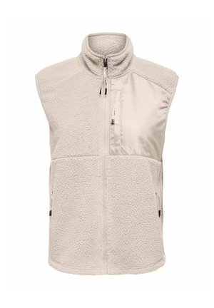 Veste en polaire beige clair avec col montant, fermeture éclair frontale, tissu texturé, et une poche poitrine zippée et lisse sur le côté droit.