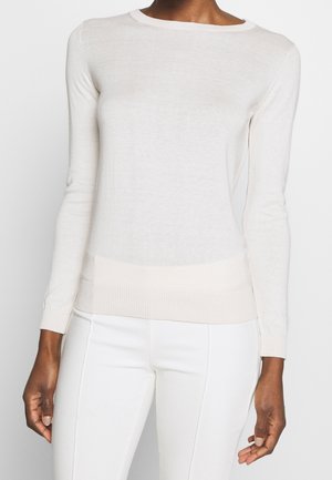 Stickad tröja - off-white