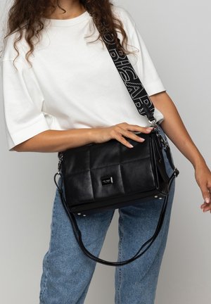 Black leather shoulder bag with a quilted design, adjustable strap featuring logo detail, and silver hardware accents.