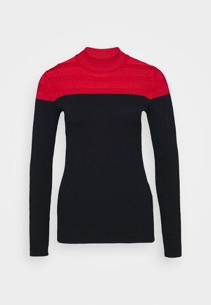 Zwart lange mouwen coltrui met een rode gestreepte patroon op de bovenste sectie, gemaakt van ribgebreide stof.