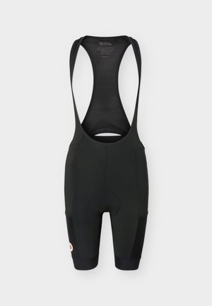 Sorte sykkelshorts med seler og nettingpanel på ryggen, samt elastiske beinåpninger, med en liten rund logo på venstre lår.