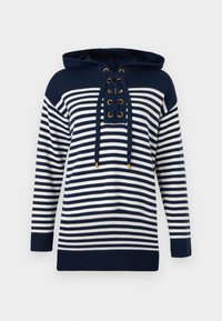 Pull en maille à manches longues rayé bleu marine et blanc avec capuche et laçage à l'avant avec œillets métalliques et cordons.