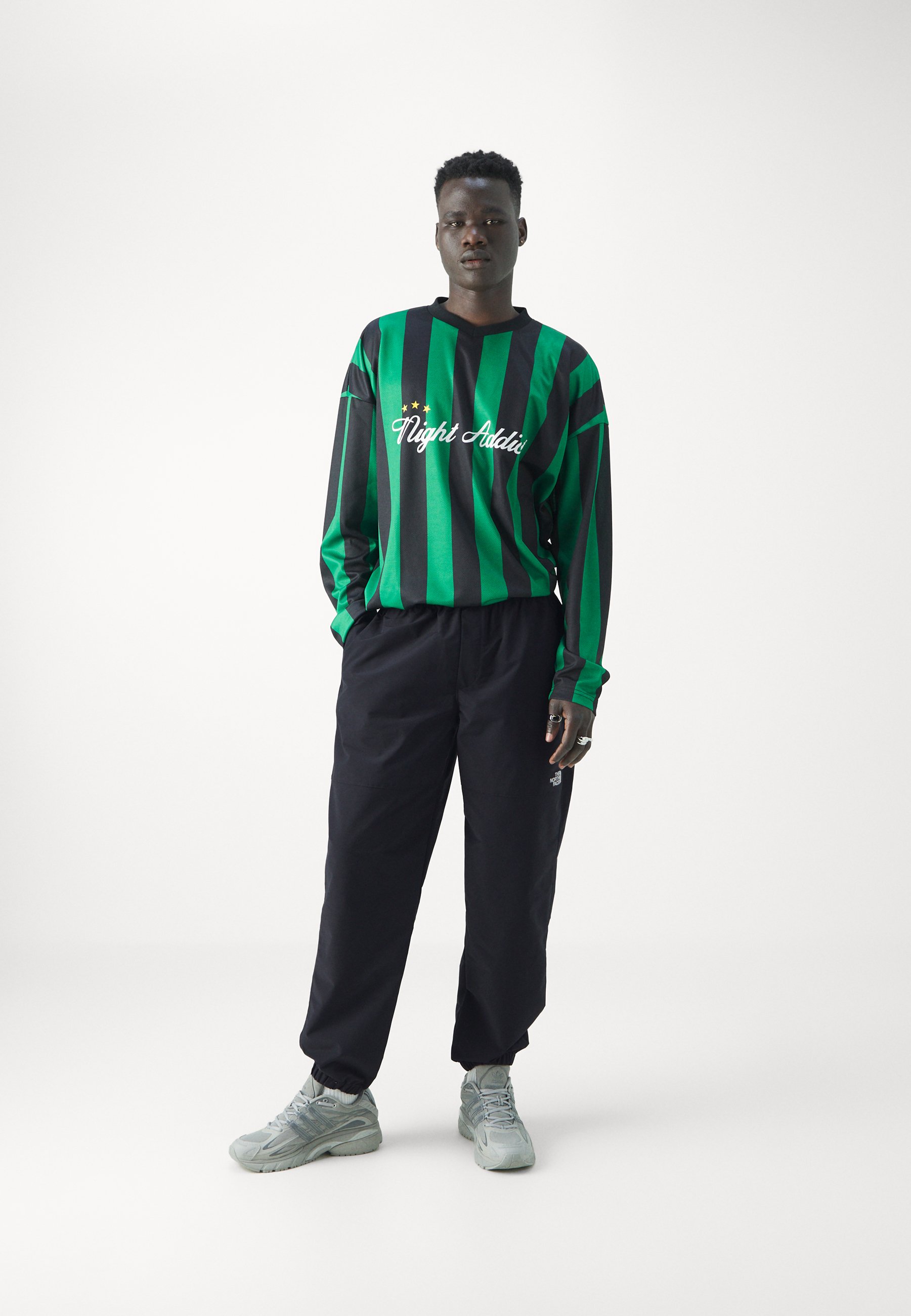 EASY WIND PANT - Tracksuit bottoms - Product Details