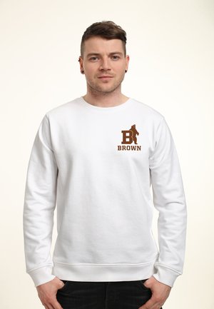 Witte sweatshirt met lange mouwen, voorzien van een bruin grafisch logo op de linkerborst. Zacht materiaal, geribde manchetten en zoom. Eenvoudig ontwerp.