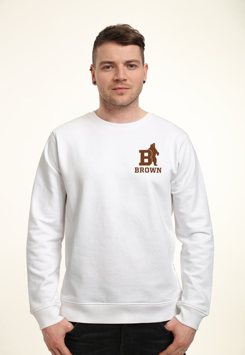 Sweatshirt blanc à manches longues, avec un logo graphique marron sur la poitrine gauche. Tissu doux, poignets et ourlet côtelés. Design simple.