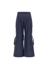Navy blue cargo pants with a wide leg design, featuring multiple side pockets and tie details at the waistband and hems. Cotton material.