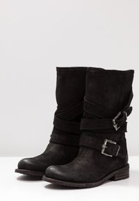 Felmini Botas camperas - black