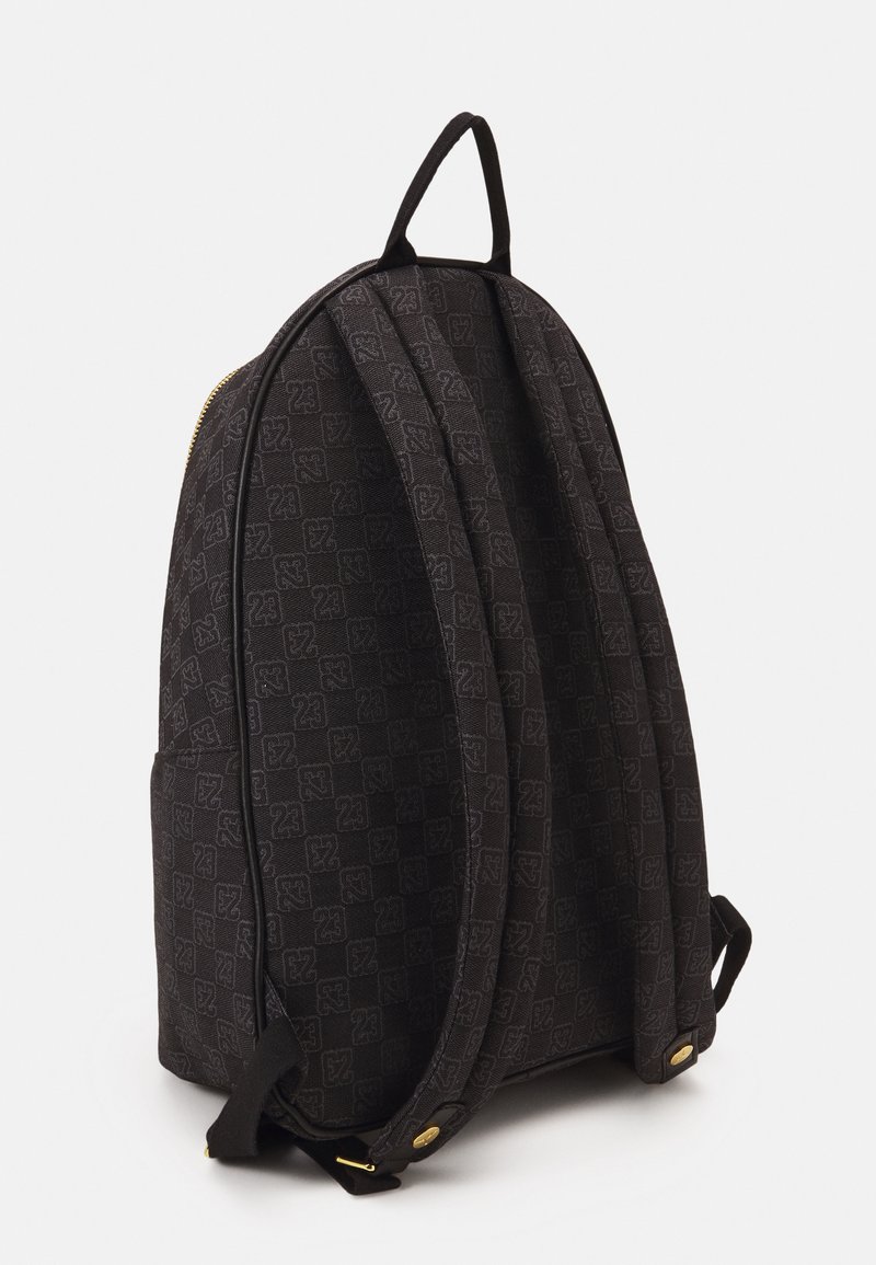 purple and white jordan backpack