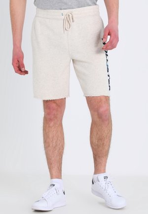 Lys grå svedshorts med bindebånd i taljen, flagrende kant og side-logo i marineblå. Fremstillet af blød, tekstureret stof.