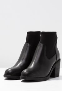 Even&Odd Tronchetti - black