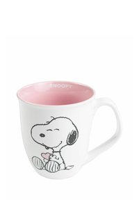Tazza in ceramica bianca con forma arrotondata, interno rosa e un'illustrazione in outline nera di Snoopy che tiene un cuore. "SNOOPY" stampato all'interno.