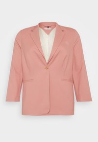 Pink blazer with a single button, two front pockets, and a light-colored inner lining. Features a subtle embroidered logo on the chest.