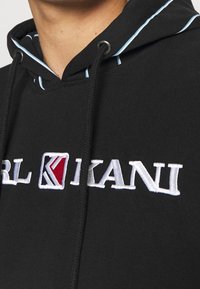 Karl Kani Felpa con cappuccio - black