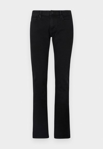 Μαύρο τζιν παντελόνι με στενή γραμμή, κανονική μέση και πέντε τσέπες. Διαθέτει διακριτική ραφή και λεία υφή.