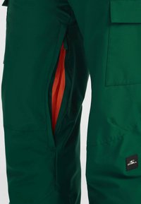 Green cargo pants with mesh-lined side vents, featuring an orange interior. Includes multiple pockets and the O'Neill logo on the lower leg.
