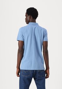 Tommy Jeans PLACKET - Polo shirt - colorado blue