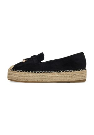 Black suede espadrille with a woven jute sole, featuring a bow accent and stitched trim along the sole's edge. Classic slip-on design.