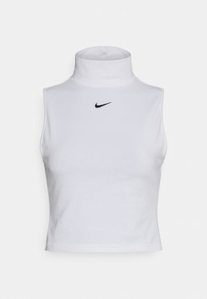 Biały bezrękawnik z golfem, krótki top z małym czarnym logo Nike swoosh na środku klatki piersiowej.