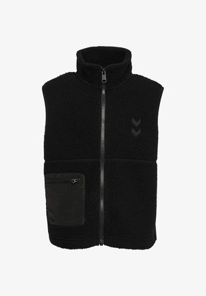 Czarna kamizelka z polaru bez rękawów, z wysokim kołnierzem, zamkiem błyskawicznym z przodu oraz kieszenią na zamek po lewej stronie. Dwa logo w kształcie litery V na prawej piersi.