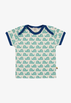 T-shirt per bambini a maniche corte color crema con motivi di lumache turchesi, bordo blu navy e tessuto di cotone morbido. Ha un'etichetta sull'orlo.