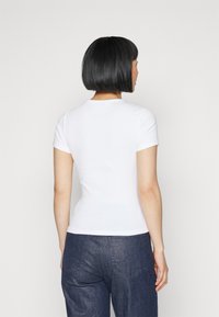 Tommy Jeans BADGE - T-Shirt basic - white