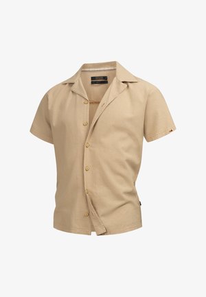 Bézs színű, rövid ujjú ing, texturált anyagból készült, hegyes gallérral, gombos záródással és hímzett díszítéssel az ujján.