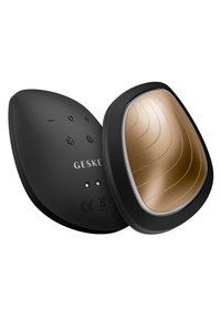 Zwart ergonomisch apparaat met een gouden, textuur oppervlak. Heeft knoppen en een LED-indicator op een afgerond, compact ontwerp.