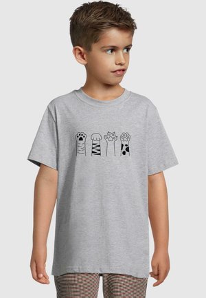 Gray cotton t-shirt featuring a graphic of five illustrated animal paws in black, showing different patterns and shapes on a soft fabric.