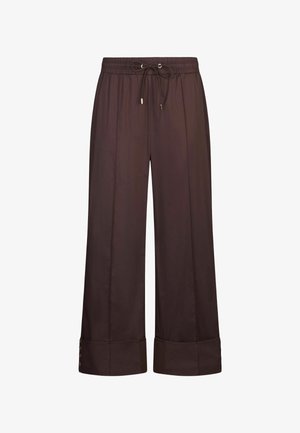 Pantalon large marron avec taille élastique et cordon de serrage, avec ourlets retroussés et détails de boutons sur les côtés.