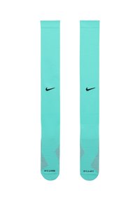Calze Nike turchesi con logo nero e strisce grigie diagonali sulla parte del piede. Design fino al ginocchio con texture liscia e forma aderente.