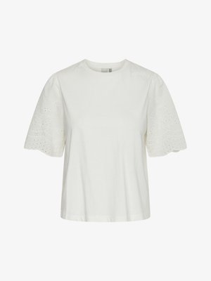 Camicia bianca a maniche corte con scollo rotondo e motivi traforati floreali ricamati sulle maniche a sbuffo.