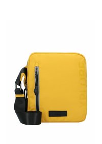 Gelbe Canvas-Schultertasche mit einer vorderen Reißverschlusstasche, schwarzen Akzenten, verstellbarem Tragegurt, glatter Textur und "EXPLORE"-Aufdruck an der Seite.