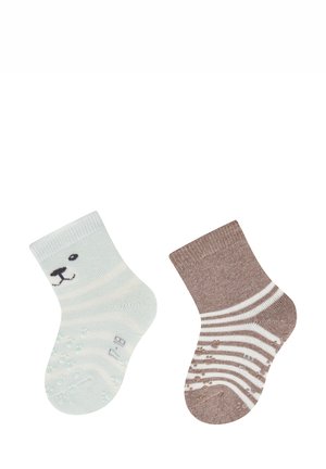 Pair of small baby socks, one light blue with a bear face, the other brown with white stripes and non-slip grips on soles.