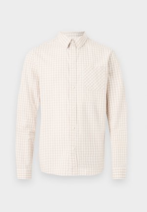 Chemise pour homme à manches longues avec un motif à carreaux beige et blanc, dotée d'un col pointu et d'une poche poitrine.