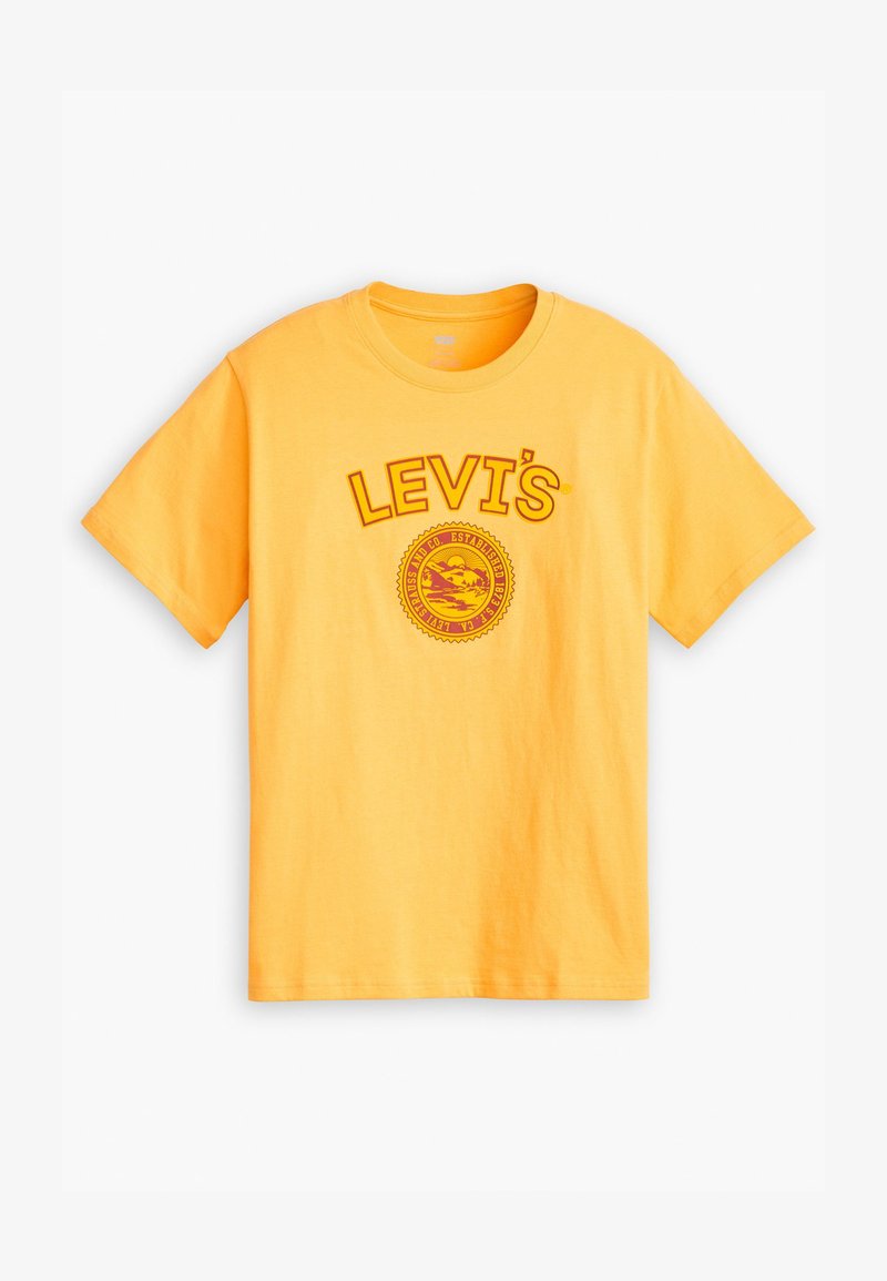 Žlté bavlnené tričko s okrúhlym výstrihom, krátkymi rukávmi a grafickou potlačou so slovom "LEVI'S" a kruhovým logom na prednej strane.
