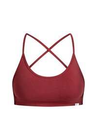 Bordeaux sport-bh met een gladde stof, een ronde halslijn en gekruiste bandjes op de achterkant. Zonder padding of beugels, naadloos ontwerp.
